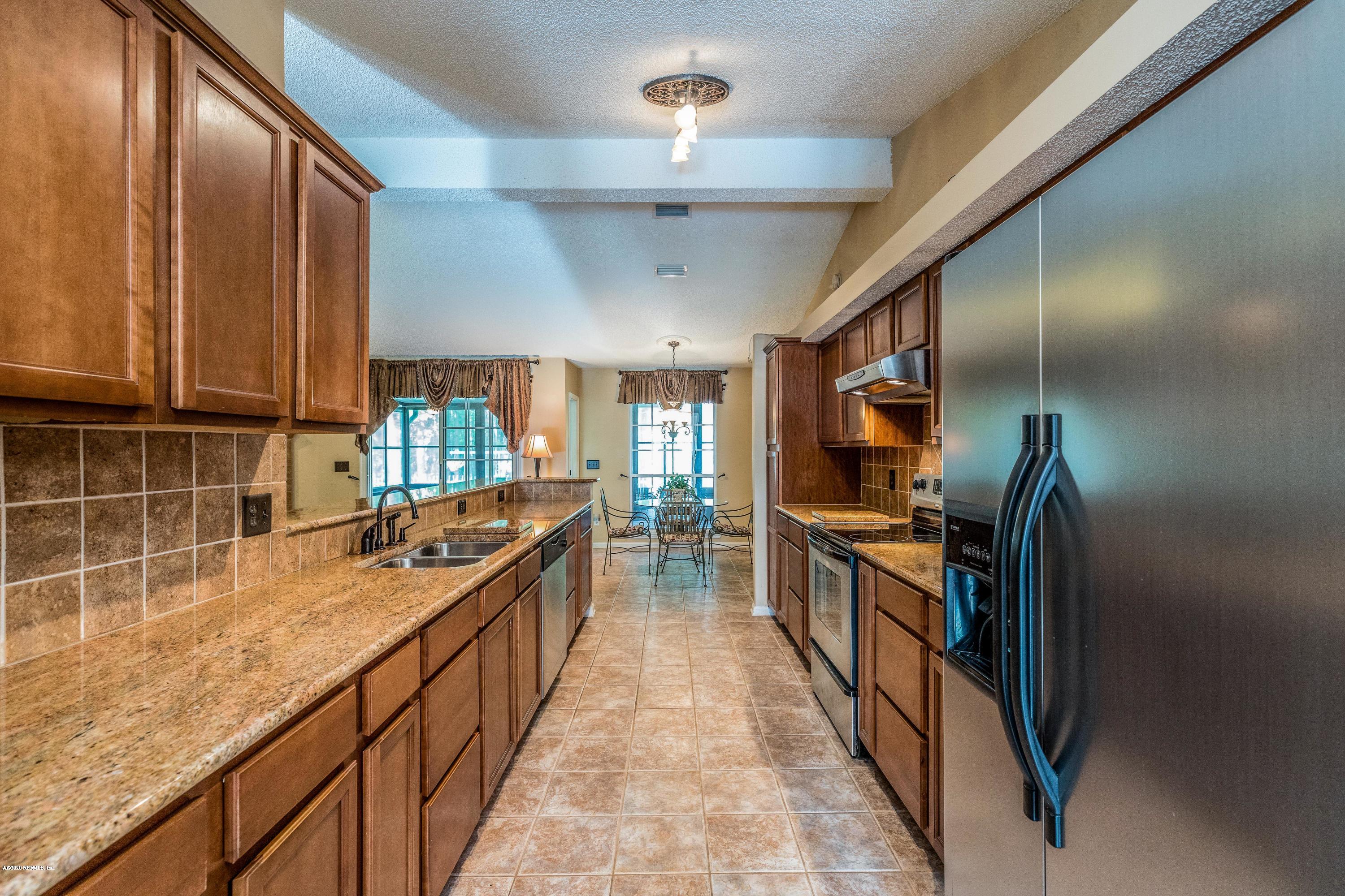 1504 Marsh Rabbit Way Fleming Island, FL 32003 - Photo 24 of 72 Kitchen w/SS Appliances
