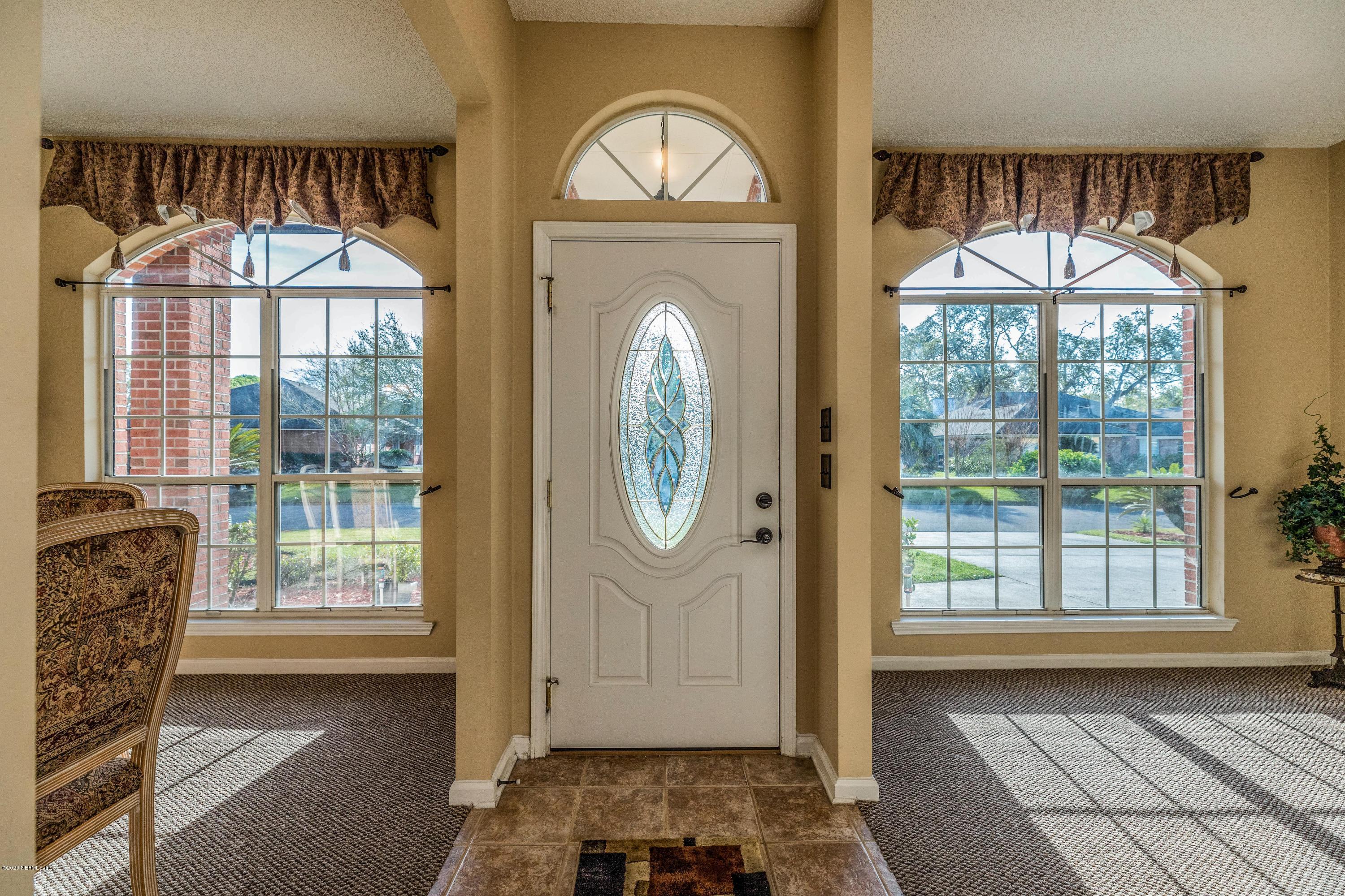 1504 Marsh Rabbit Way Fleming Island, FL 32003 - Photo 3 of 72 Foyer/Living/Dining
