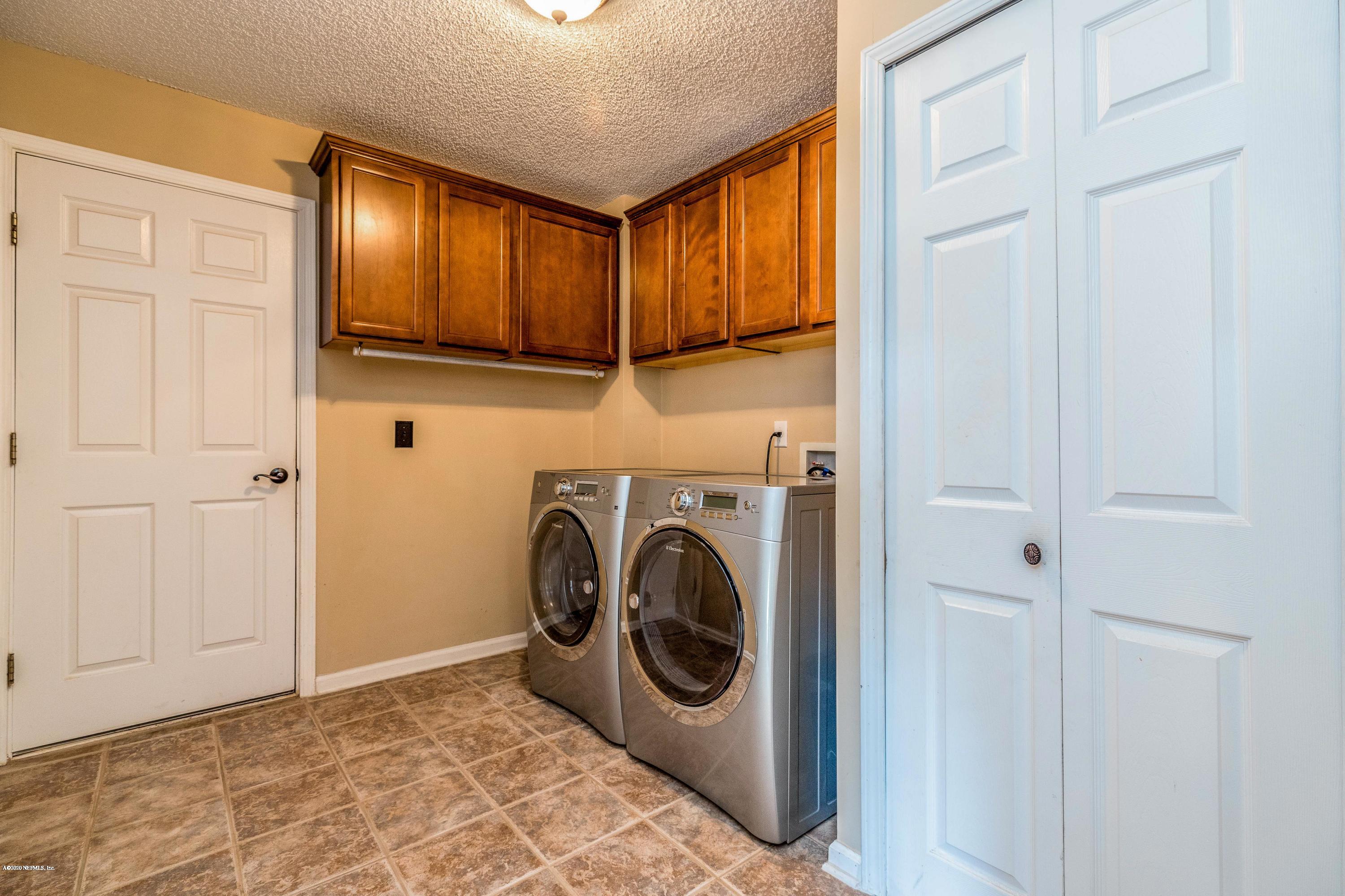 1504 Marsh Rabbit Way Fleming Island, FL 32003 - Photo 34 of 72 Laundry Room