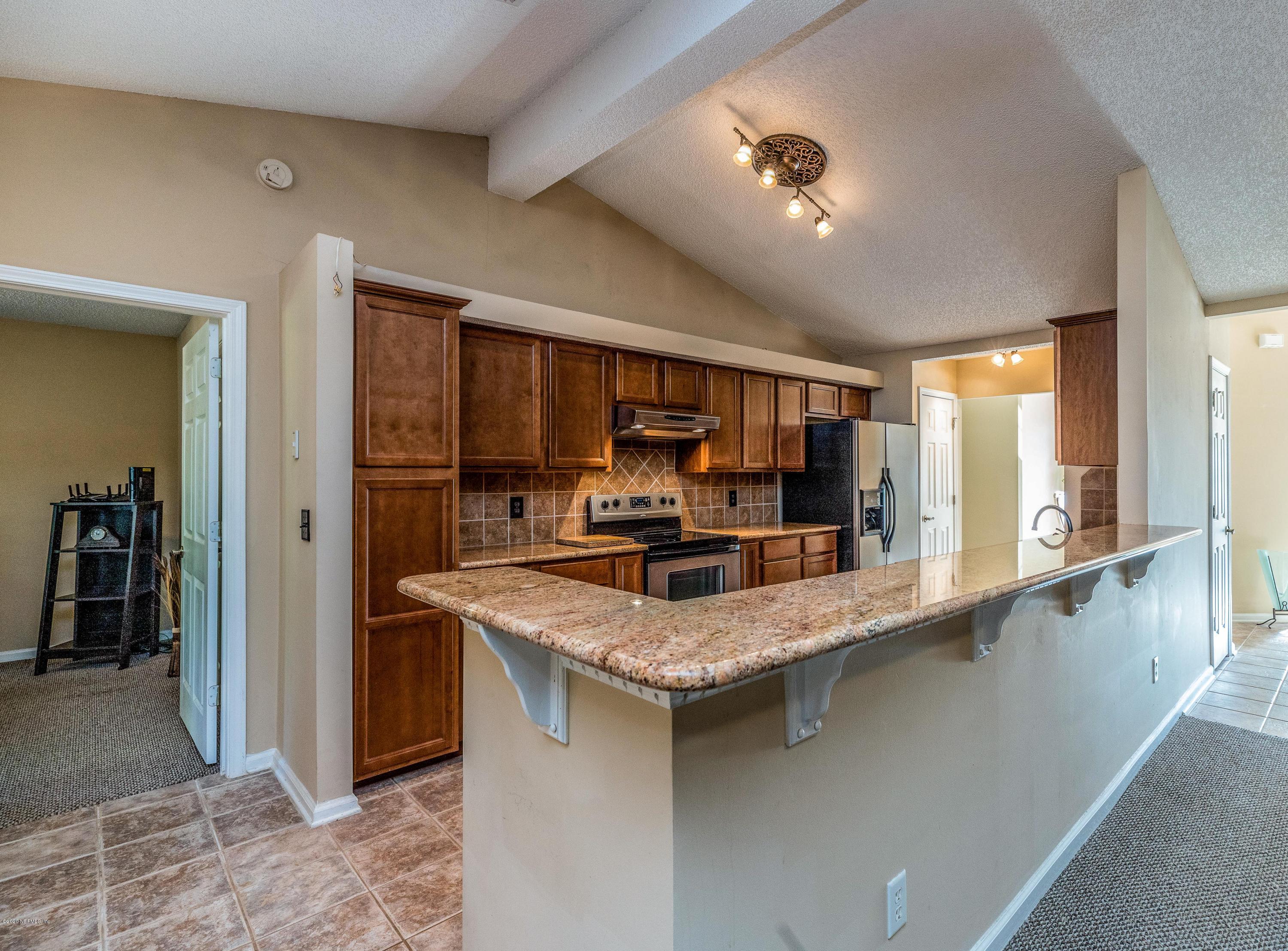 1504 Marsh Rabbit Way Fleming Island, FL 32003 - Photo 4 of 72 Kitchen Breakfast Bar