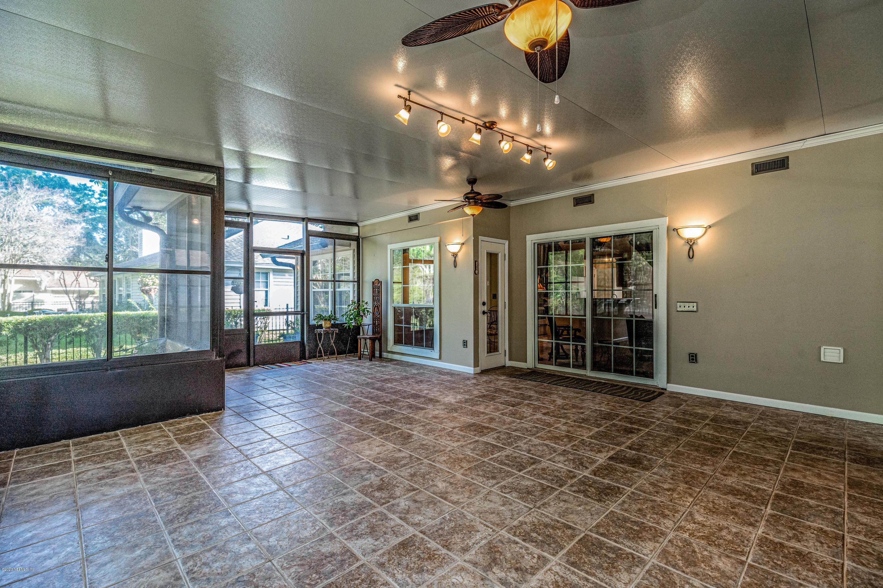 1504 Marsh Rabbit Way Fleming Island, FL 32003 - Photo 10 of 72 Large Florida Room
