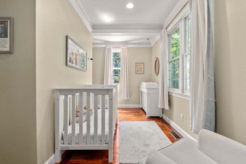 114 Fox Run Road Bolton, MA 01740 - Photo 15 of 37 a view of a hallway with windows and stairs