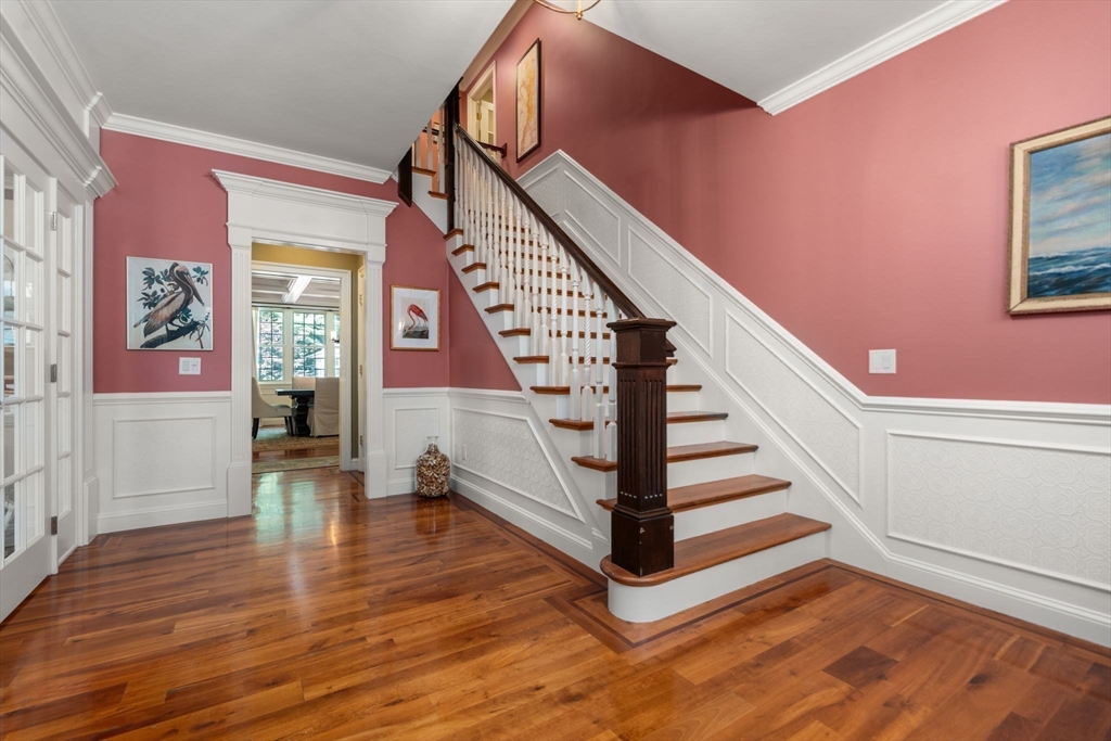 114 Fox Run Road Bolton, MA 01740 - Photo 16 of 37 a view of an entryway with wooden floor and stairs