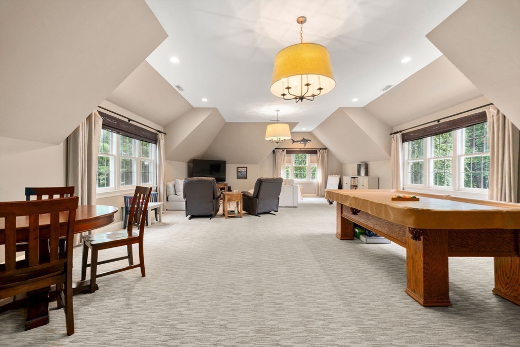 114 Fox Run Road Bolton, MA 01740 - Photo 17 of 37 a large hall with a table and chairs