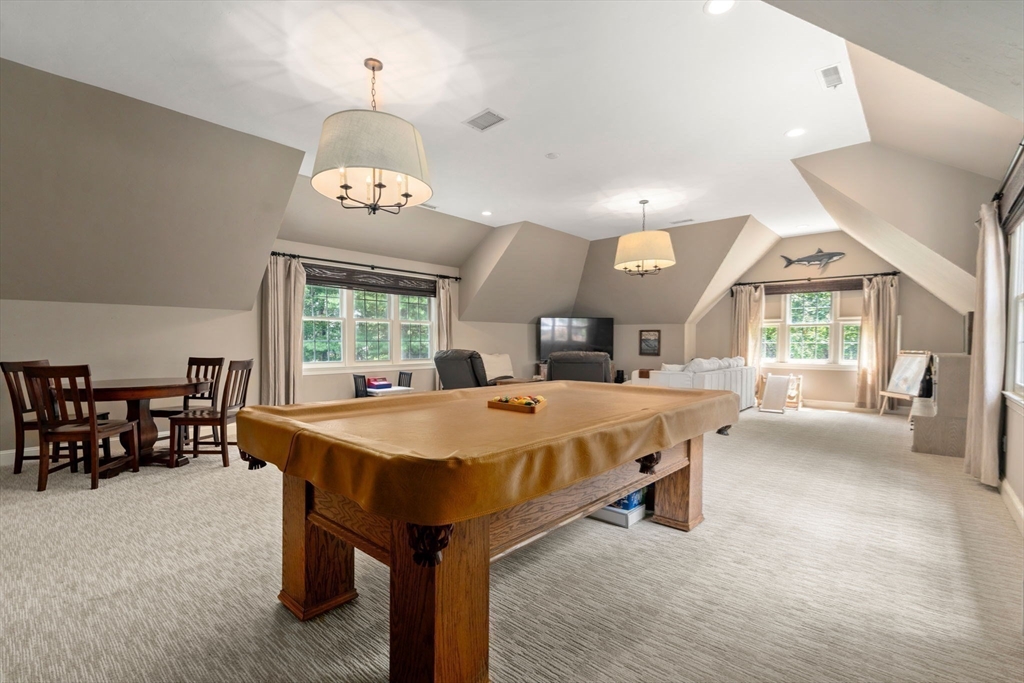 114 Fox Run Road Bolton, MA 01740 - Photo 18 of 37 a large kitchen with a table and chairs