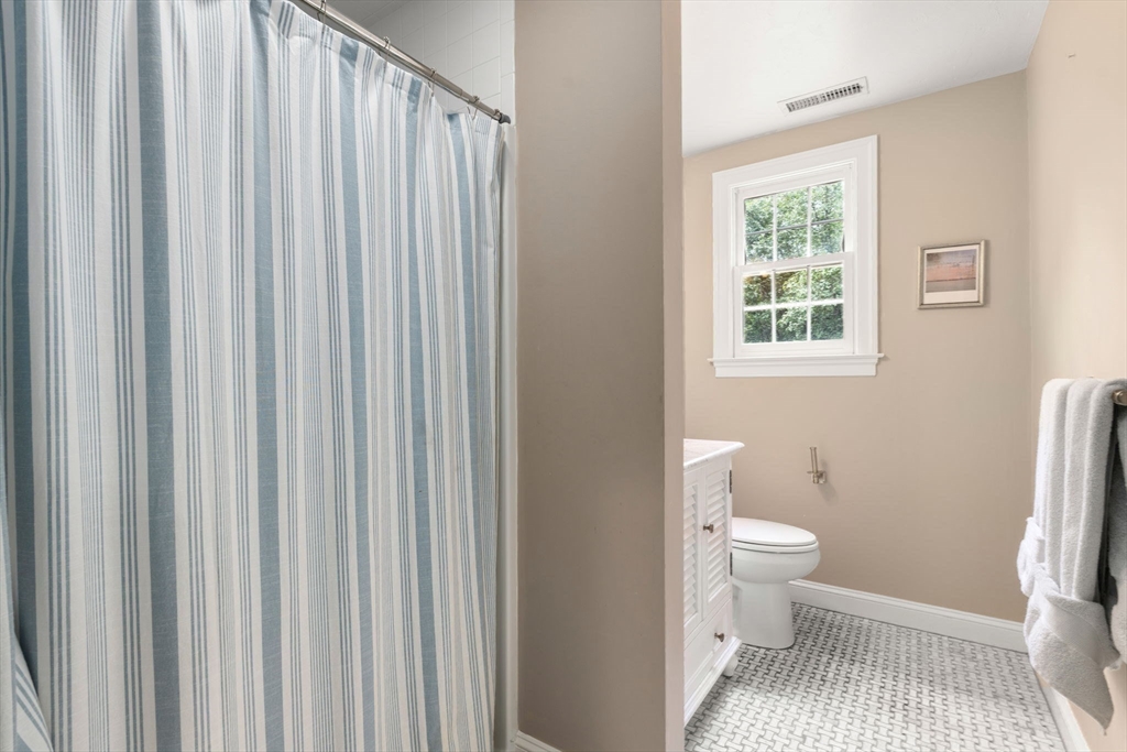 114 Fox Run Road Bolton, MA 01740 - Photo 24 of 37 a bathroom with a toilet and a window