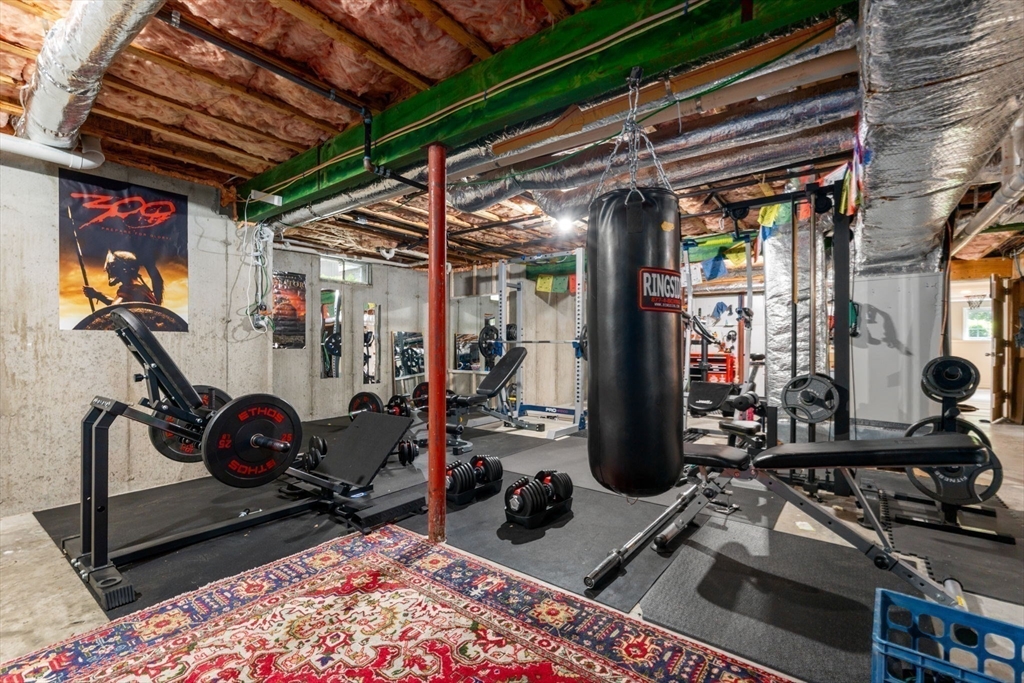 114 Fox Run Road Bolton, MA 01740 - Photo 29 of 37 a view of a room with gym equipment