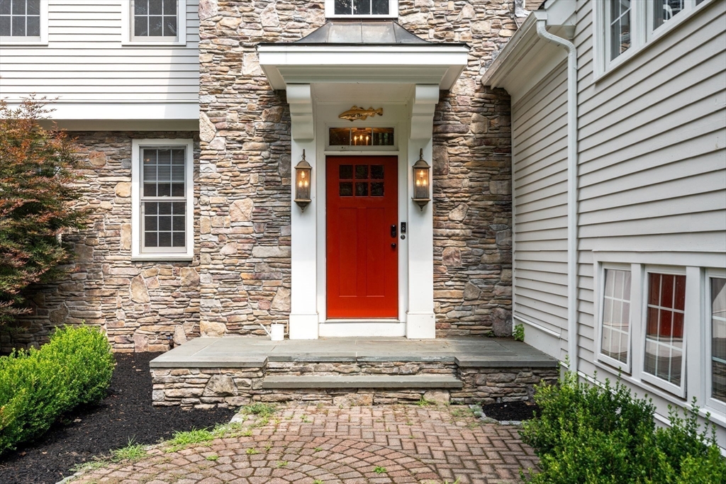 114 Fox Run Road Bolton, MA 01740 - Photo 3 of 37 a front view of a house with a yard