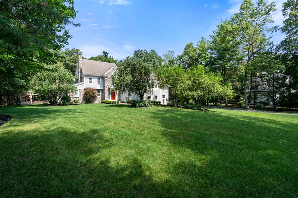 114 Fox Run Road Bolton, MA 01740 - Photo 37 of 37 a view of a house with a big yard and large trees