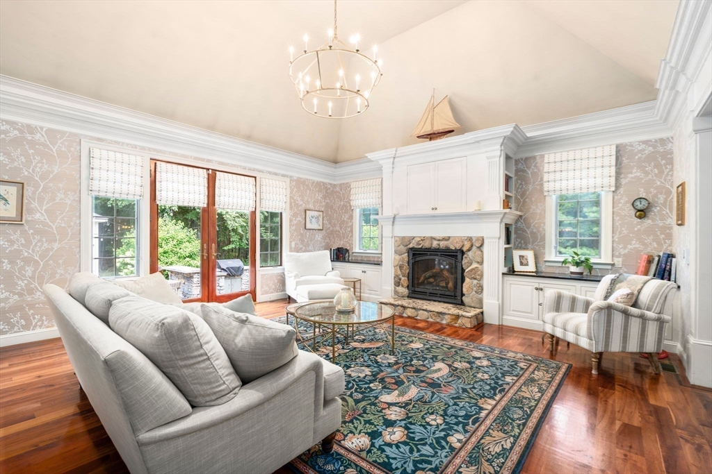 114 Fox Run Road Bolton, MA 01740 - Photo 4 of 37 a living room with furniture large window and a fireplace