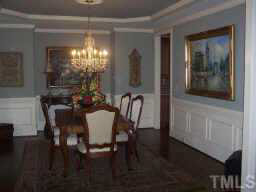 1021 Quiet Ridge Circle Raleigh, NC 27614 - Photo 4 of 9 a dining room with furniture and window
