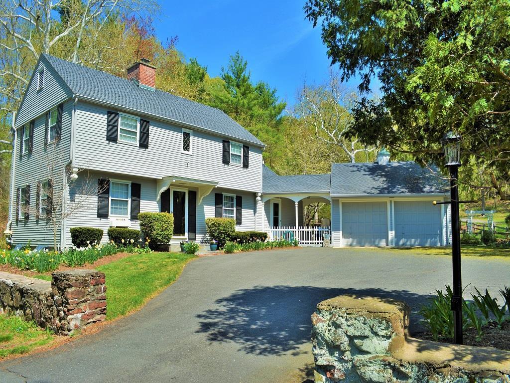 400 Waterville Road Avon, CT 06001 - Photo 1 of 1 a front view of a house with a yard