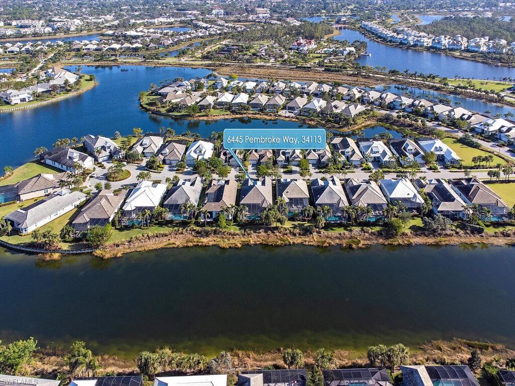 6445 Pembroke Way Naples, FL 34113 - Photo 24 of 40 an aerial view of residential houses with outdoor space