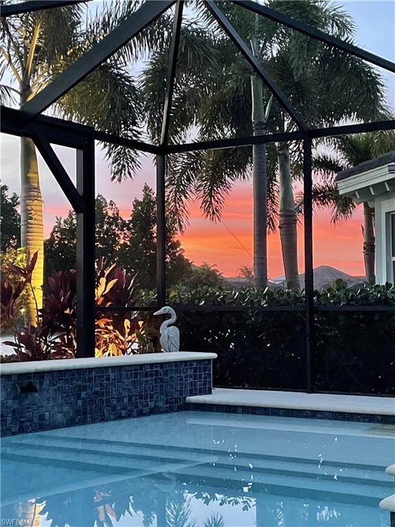 6445 Pembroke Way Naples, FL 34113 - Photo 28 of 40 a view of outdoor space with fountain