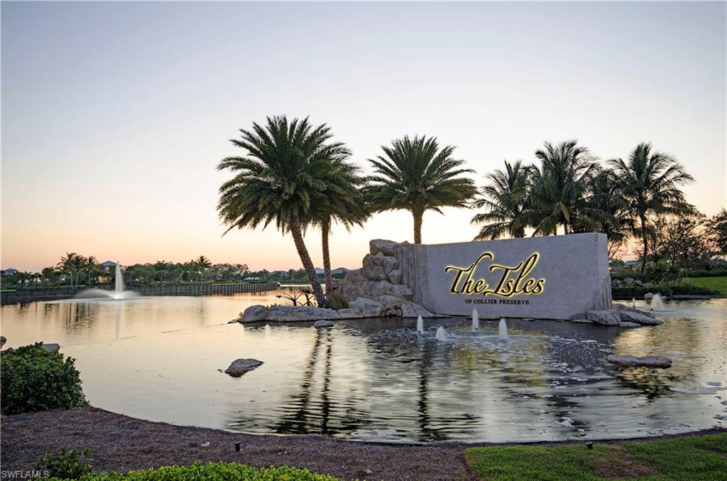 6445 Pembroke Way Naples, FL 34113 - Photo 29 of 40 a sign board with lake view