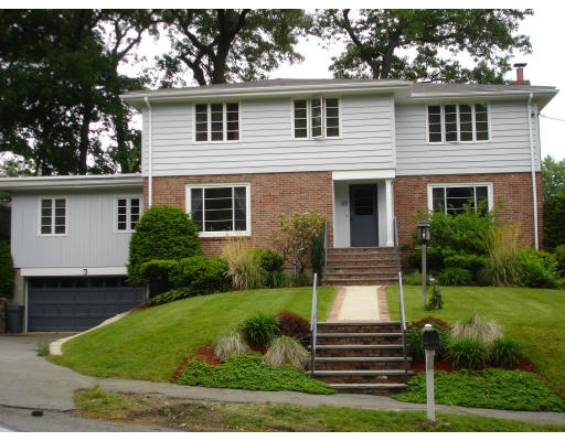 89 Ridge Street Arlington, MA 02474 - Photo 1 of 1 a front view of a house with garden
