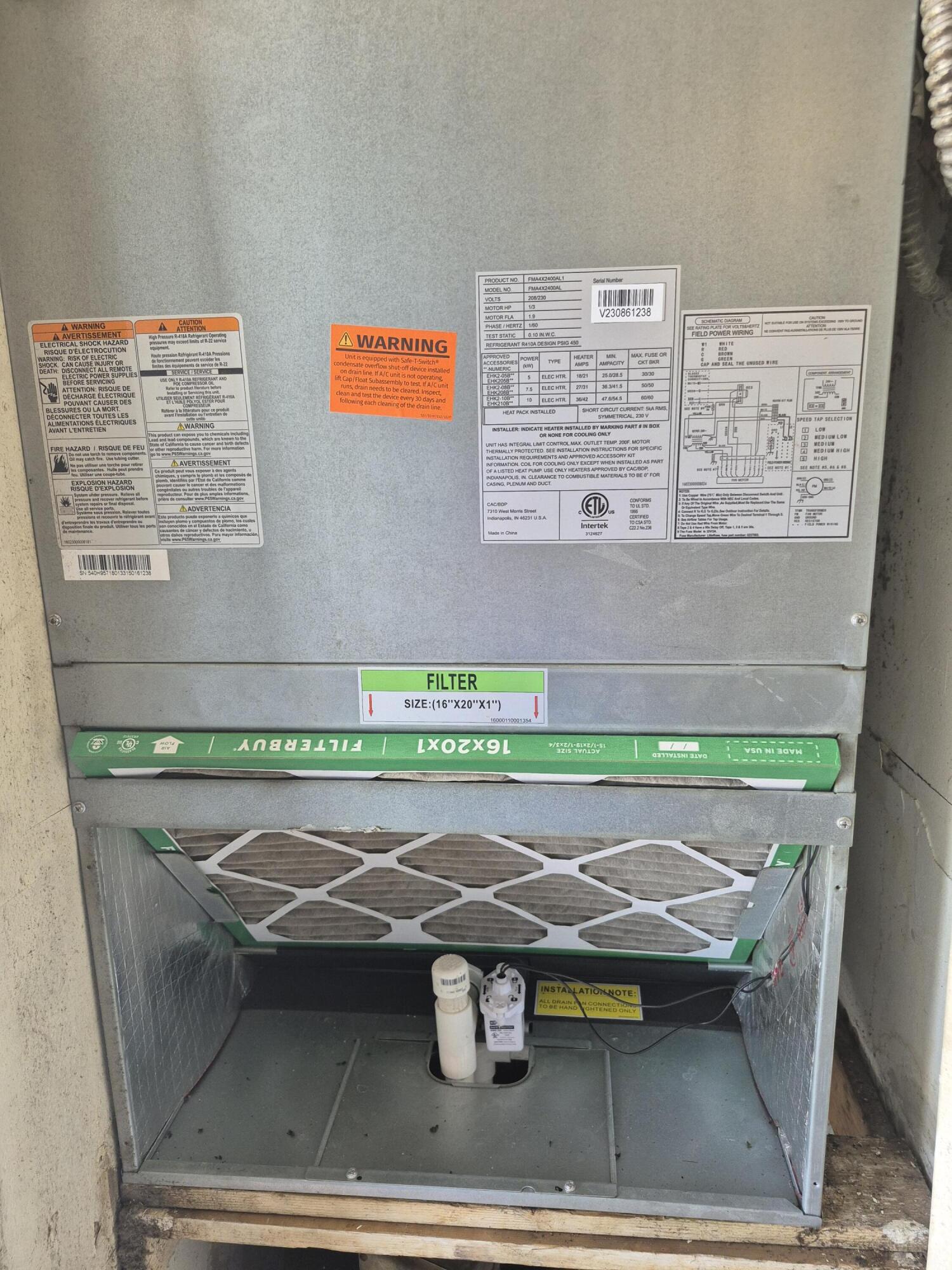 2050 North Congress Avenue, Unit 407 West Palm Beach, FL 33401 - Photo 3 of 16 a view of table and chair