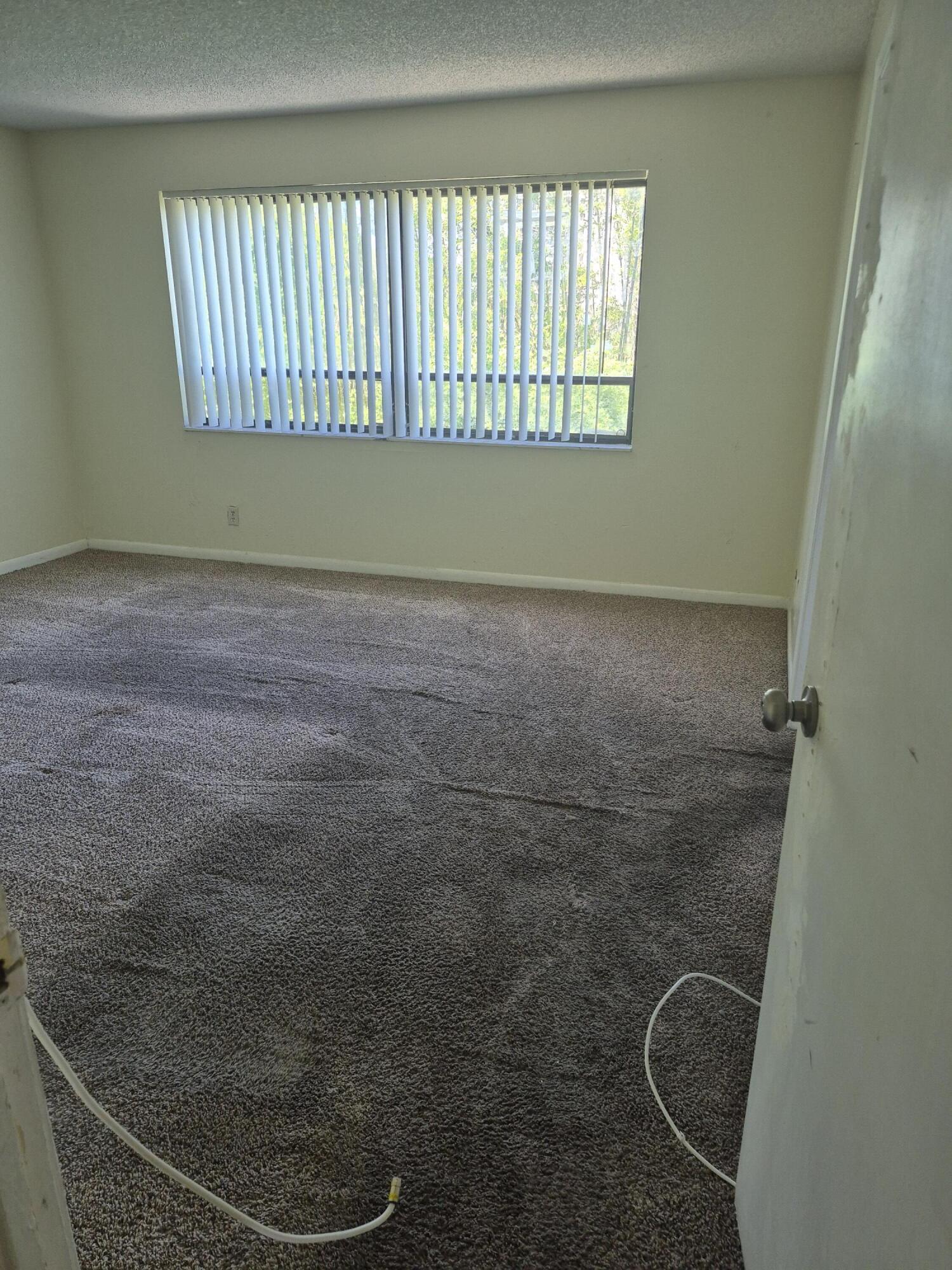 2050 North Congress Avenue, Unit 407 West Palm Beach, FL 33401 - Photo 5 of 16 a bathroom with a window