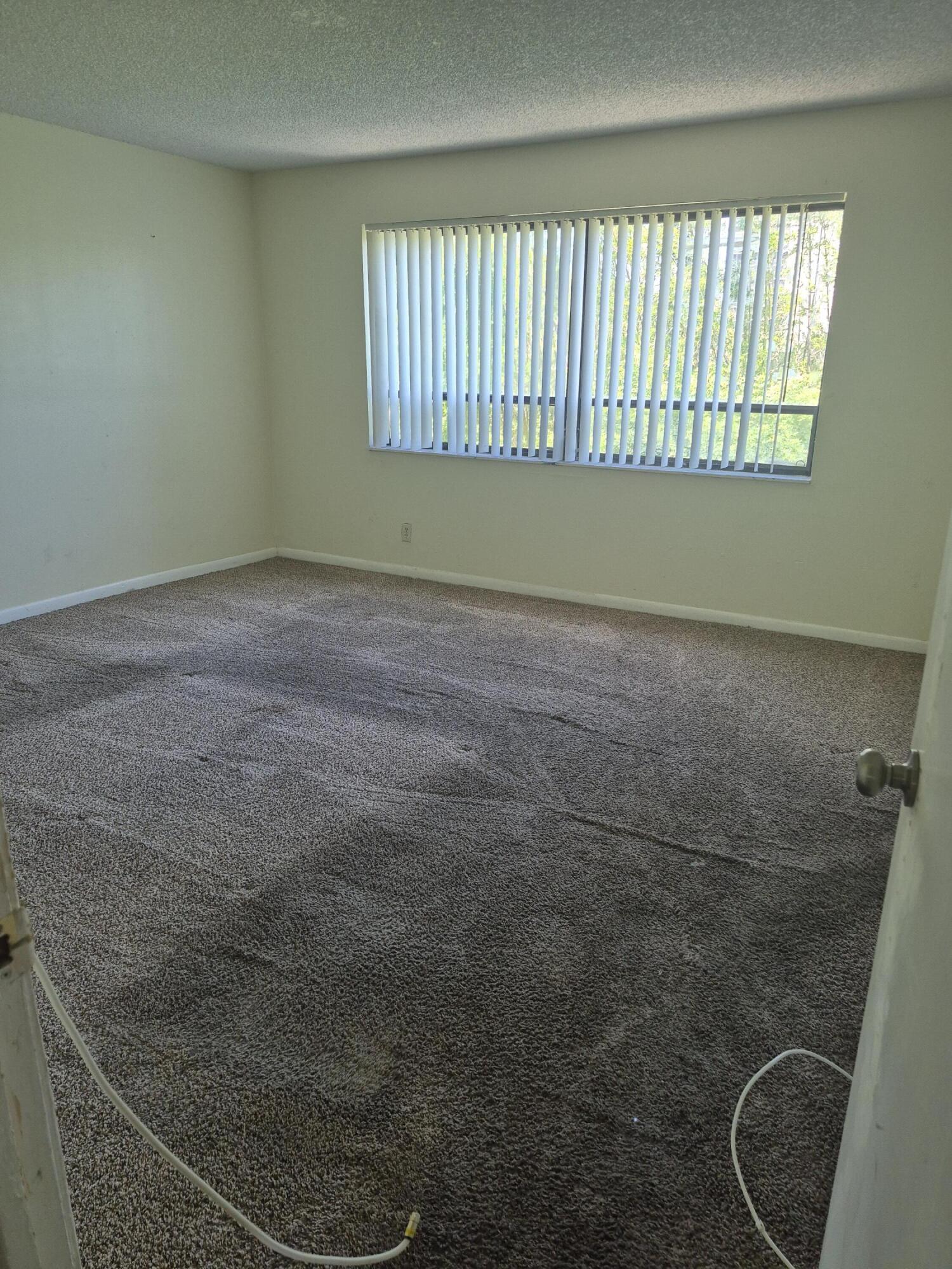 2050 North Congress Avenue, Unit 407 West Palm Beach, FL 33401 - Photo 8 of 16 a bathroom with a window