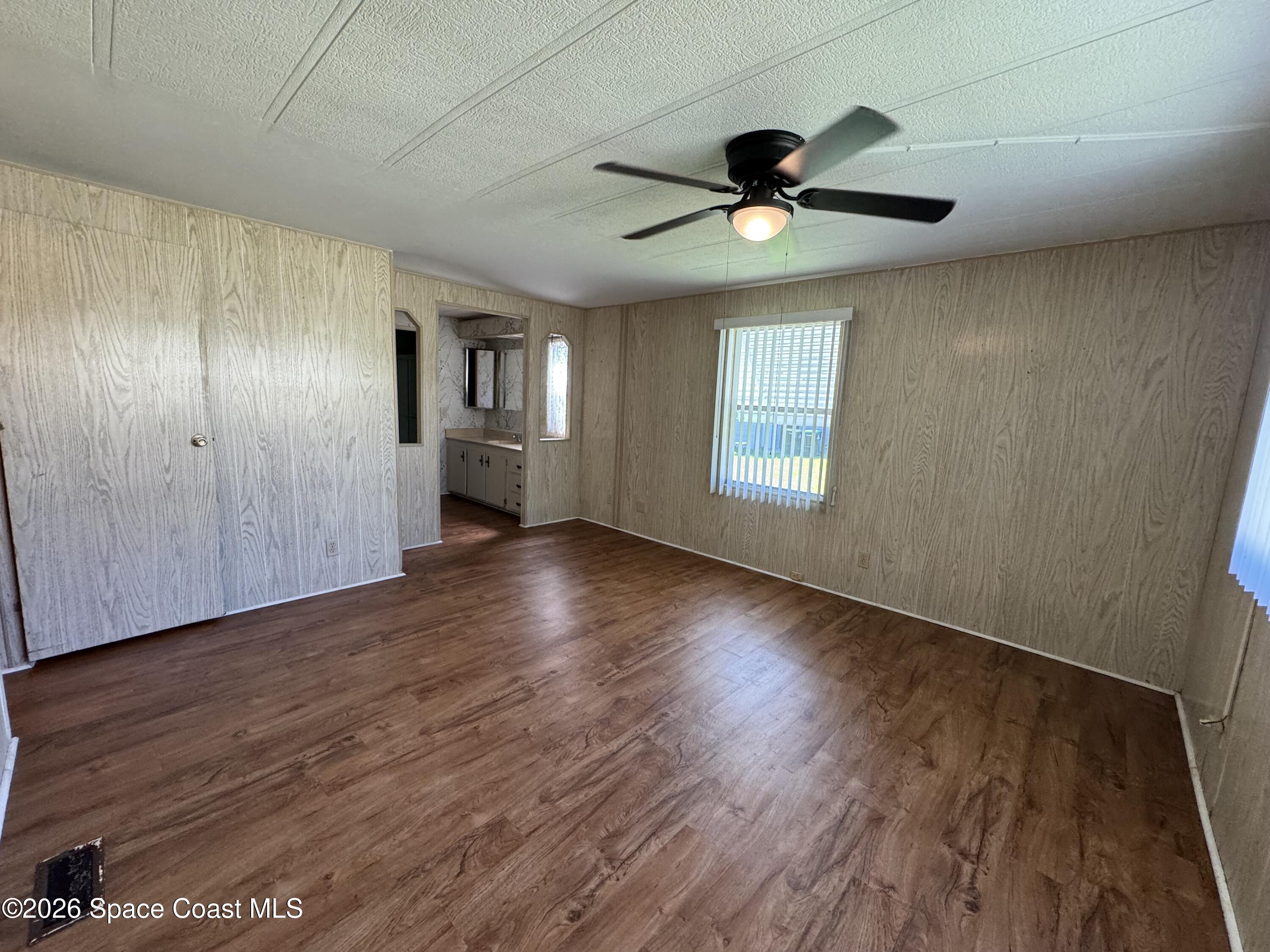 1894 Coco Plum Street Northeast Palm Bay, FL 32905 - Photo 12 of 27 Primary Bedroom