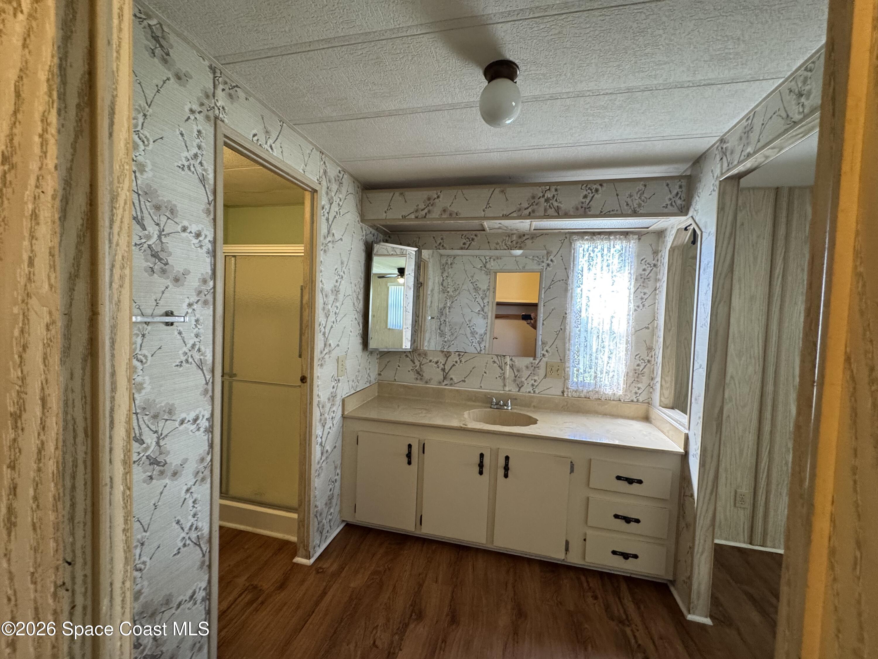 1894 Coco Plum Street Northeast Palm Bay, FL 32905 - Photo 15 of 27 Primary Bath