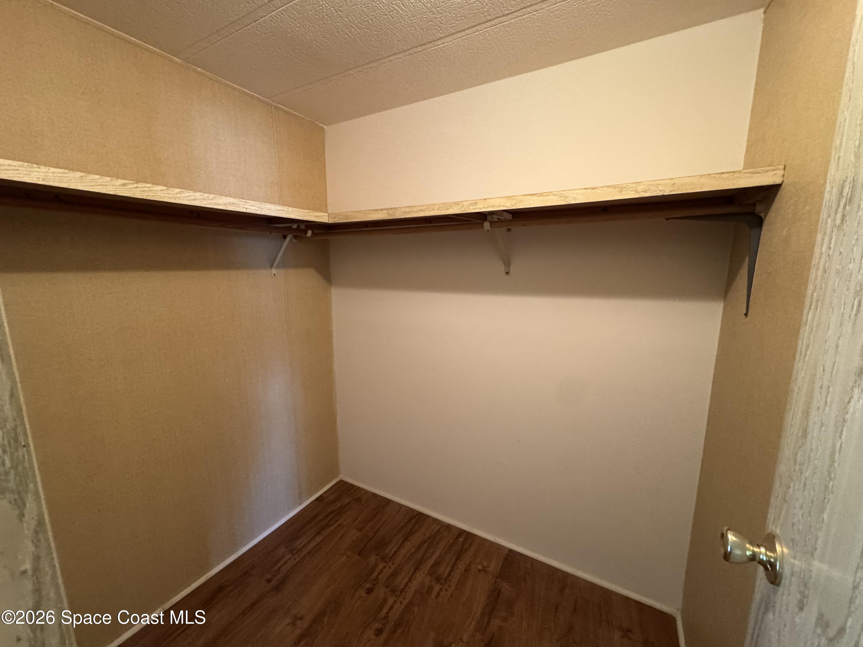 1894 Coco Plum Street Northeast Palm Bay, FL 32905 - Photo 20 of 27 Guest Closet