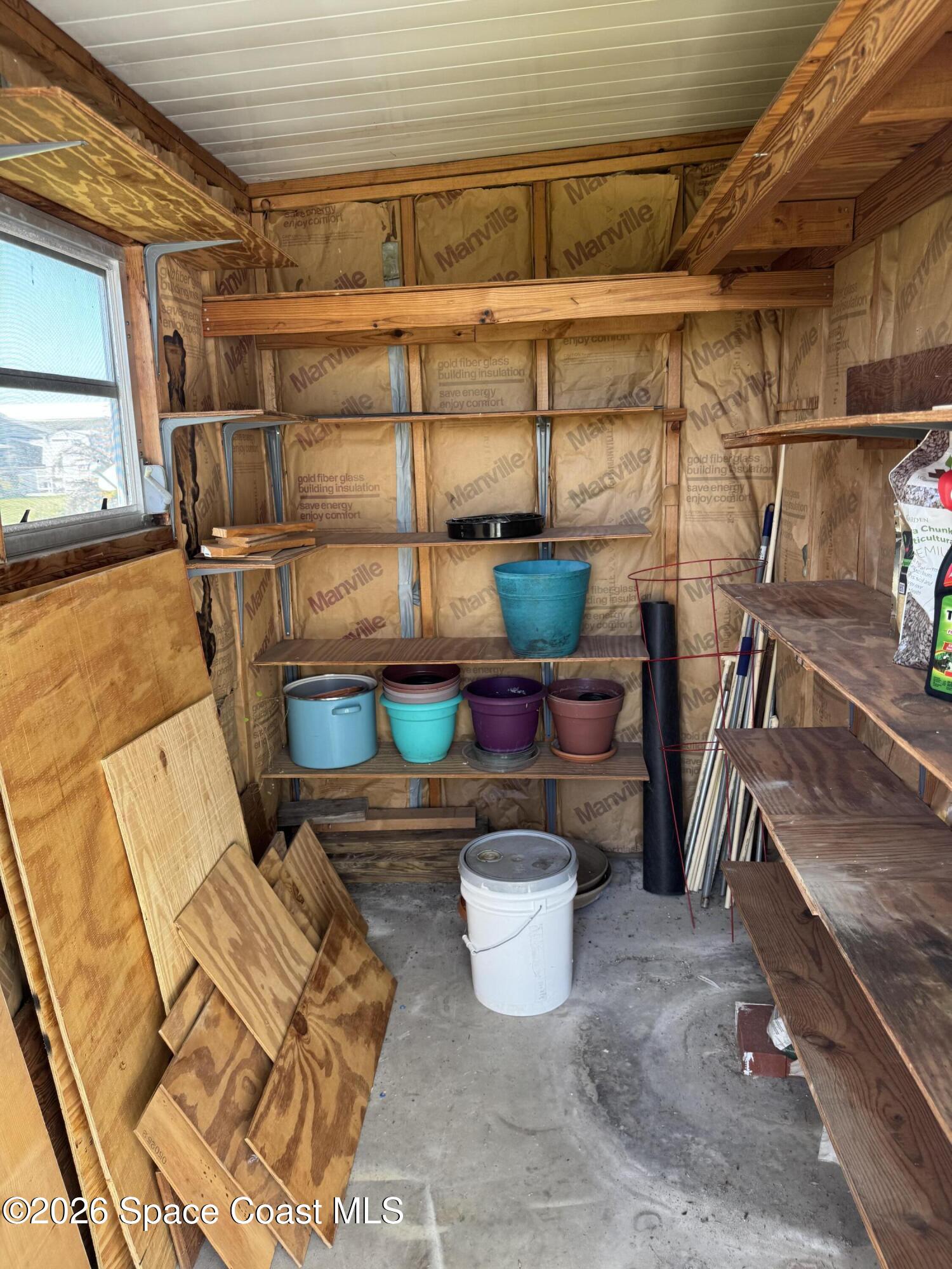 1894 Coco Plum Street Northeast Palm Bay, FL 32905 - Photo 26 of 27 Outside storage