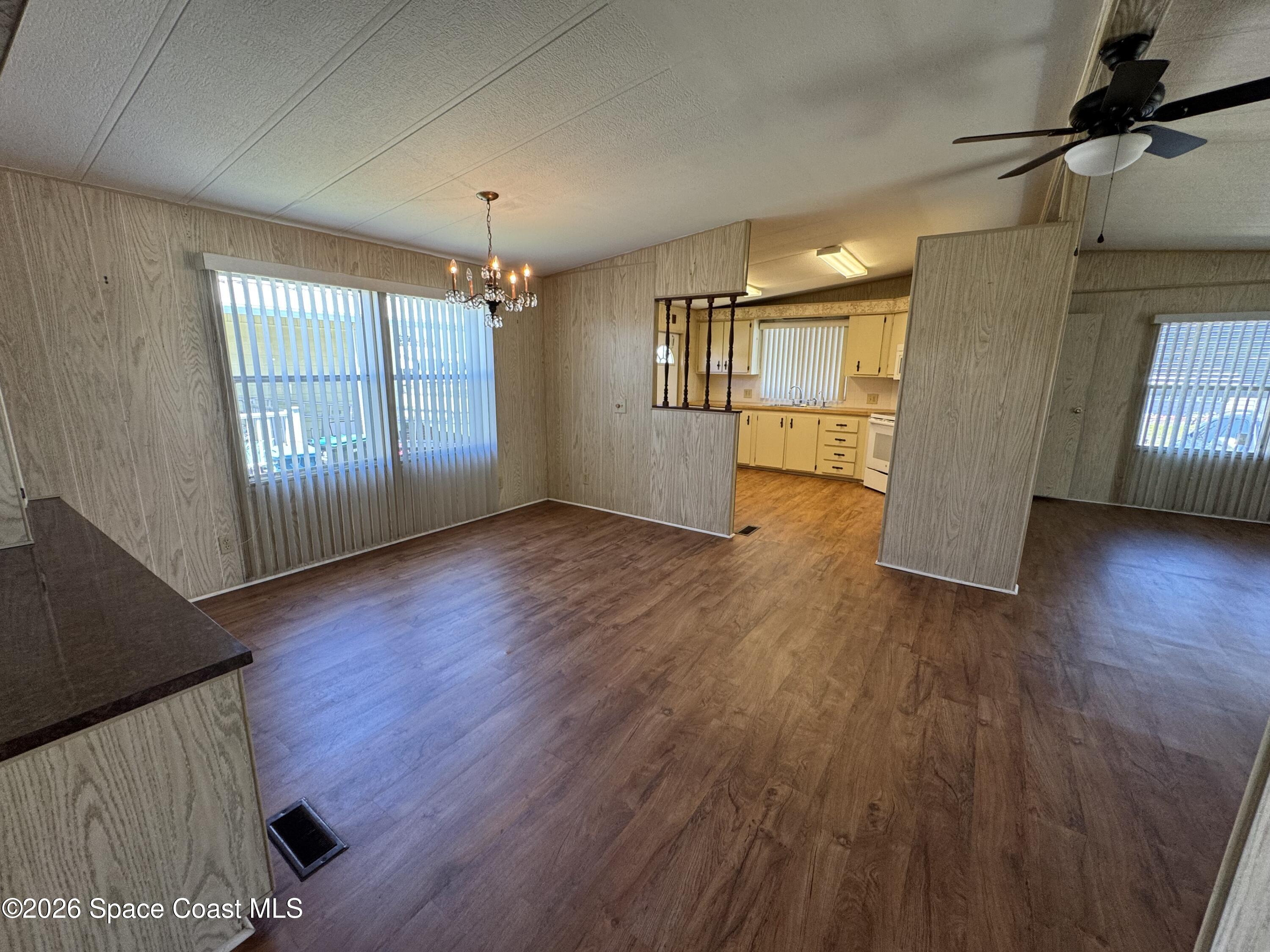 1894 Coco Plum Street Northeast Palm Bay, FL 32905 - Photo 10 of 27 Dining to Kitchen