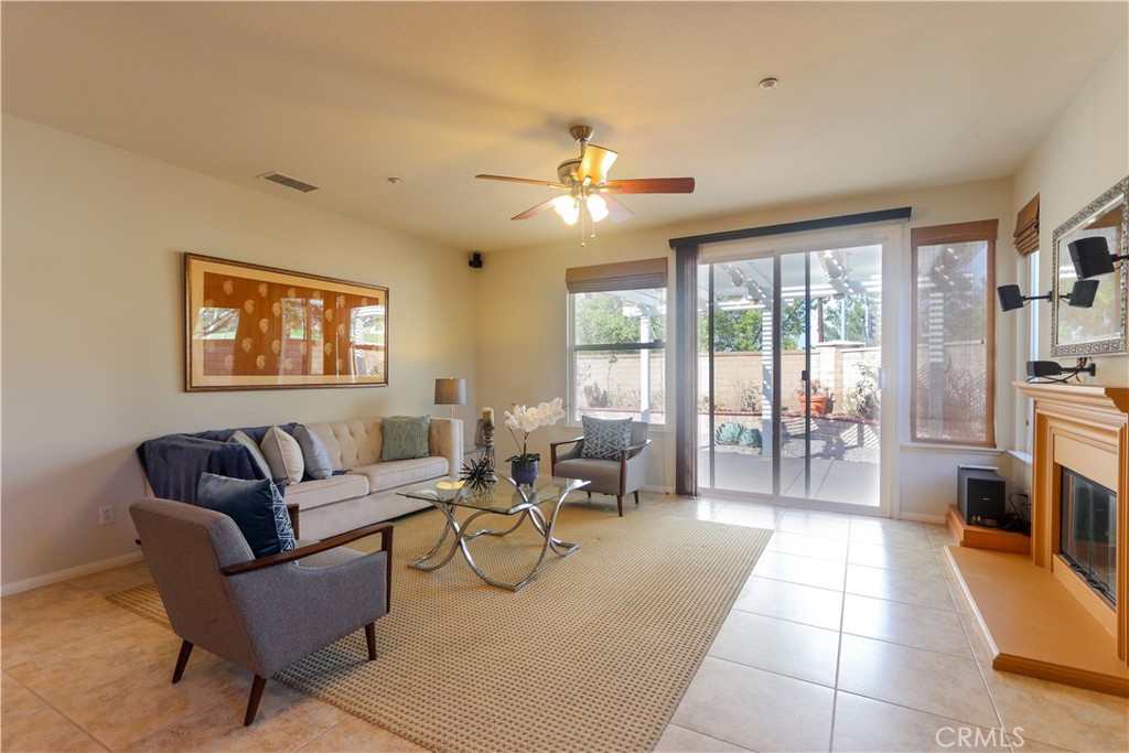 327 Tomko Way Placentia, CA 92870 - Photo 14 of 47 a living room with furniture and a fireplace