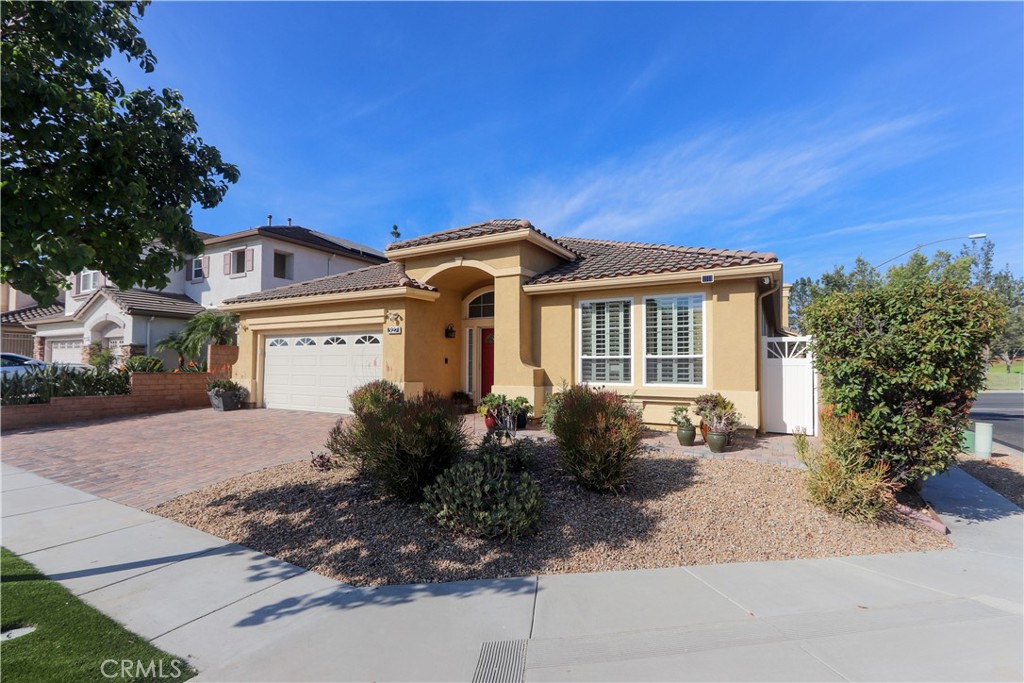 327 Tomko Way Placentia, CA 92870 - Photo 3 of 47 a front view of a house with garden