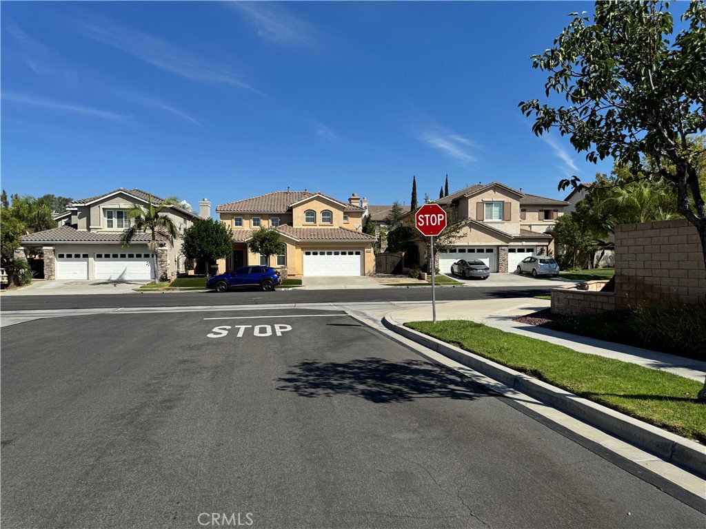 327 Tomko Way Placentia, CA 92870 - Photo 47 of 47 a view of a street with a cars parked in front of it