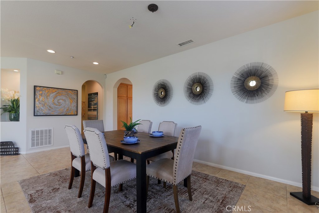 327 Tomko Way Placentia, CA 92870 - Photo 7 of 47 a view of a dining room with furniture and wooden floor