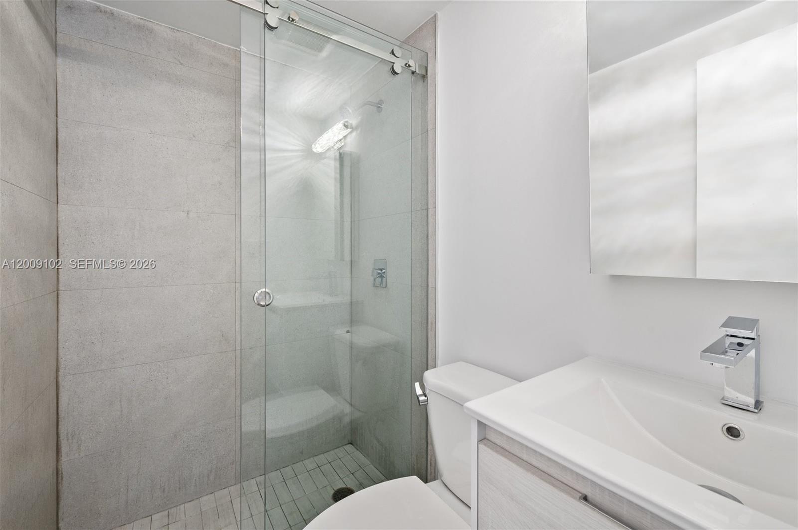 330 Southwest 27th Road Miami, FL 33129 - Photo 36 of 62 a bathroom with a sink toilet and shower