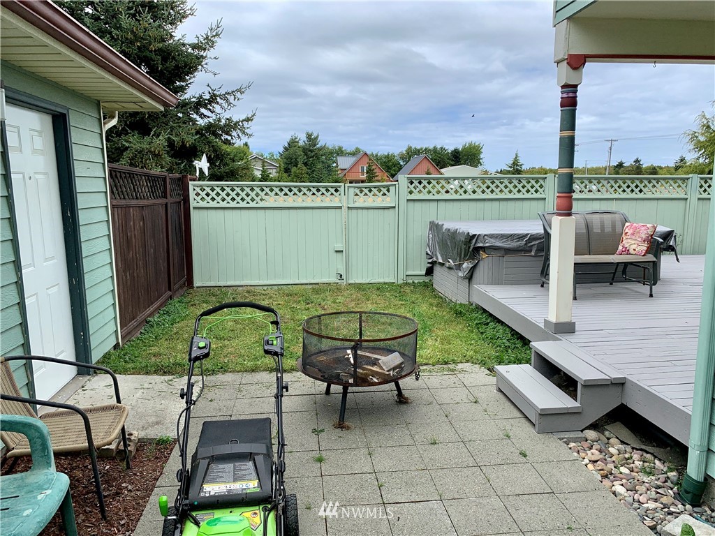 52 Greywolf Road Sequim, WA 98382 - Photo 11 of 31 a view of a chairs and table in the terrace