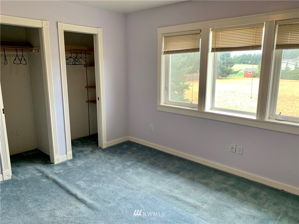 52 Greywolf Road Sequim, WA 98382 - Photo 23 of 31 an empty room with a window