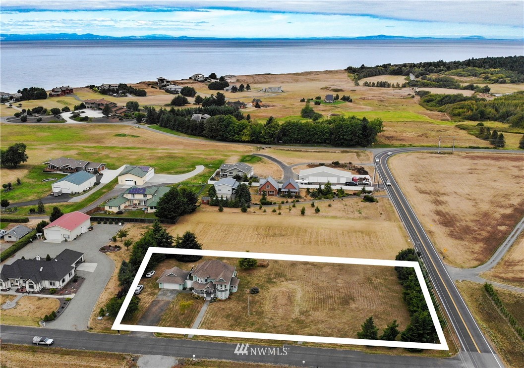 52 Greywolf Road Sequim, WA 98382 - Photo 26 of 31 a view of swimming pool and an ocean view