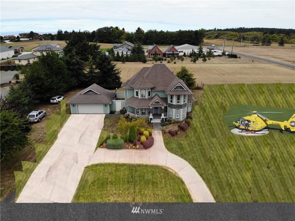 52 Greywolf Road Sequim, WA 98382 - Photo 31 of 31 a view of a swimming pool and lounge chair
