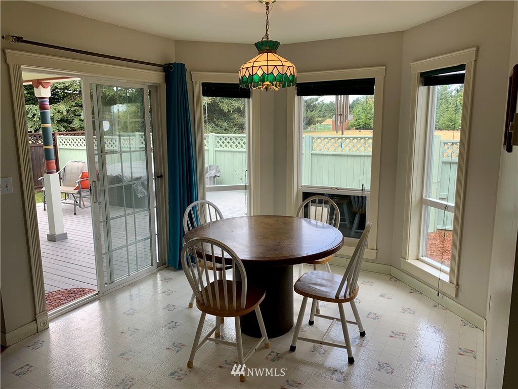 52 Greywolf Road Sequim, WA 98382 - Photo 8 of 31 a dining room with furniture and window