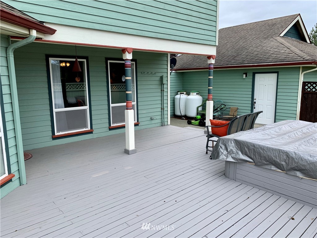 52 Greywolf Road Sequim, WA 98382 - Photo 10 of 31 a front view of a house with seating space