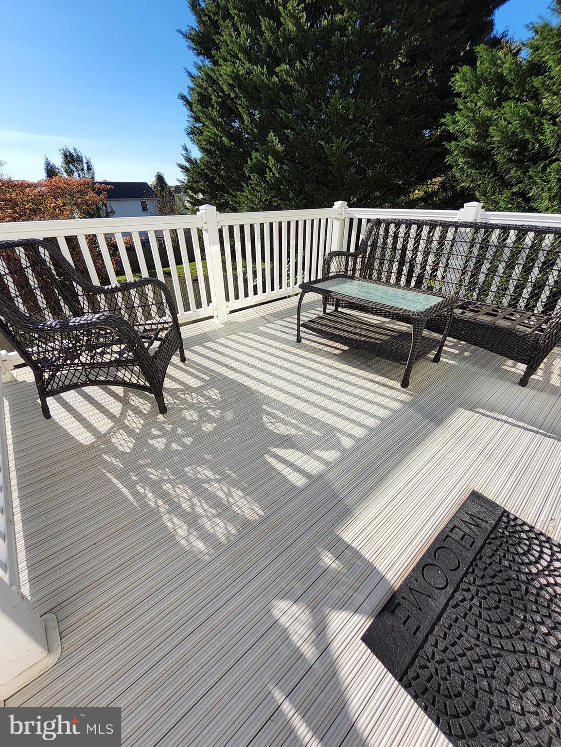 613 Clubhouse Way Culpeper, VA 22701 - Photo 11 of 17 a view of balcony with wooden floor