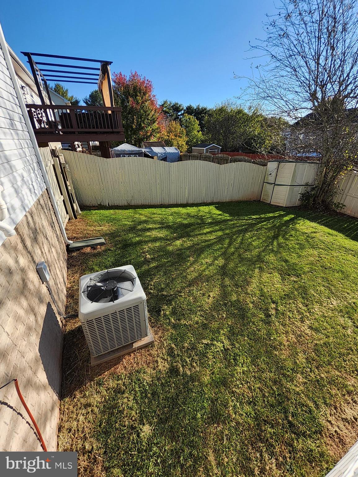 613 Clubhouse Way Culpeper, VA 22701 - Photo 16 of 17 a view of backyard with seating space