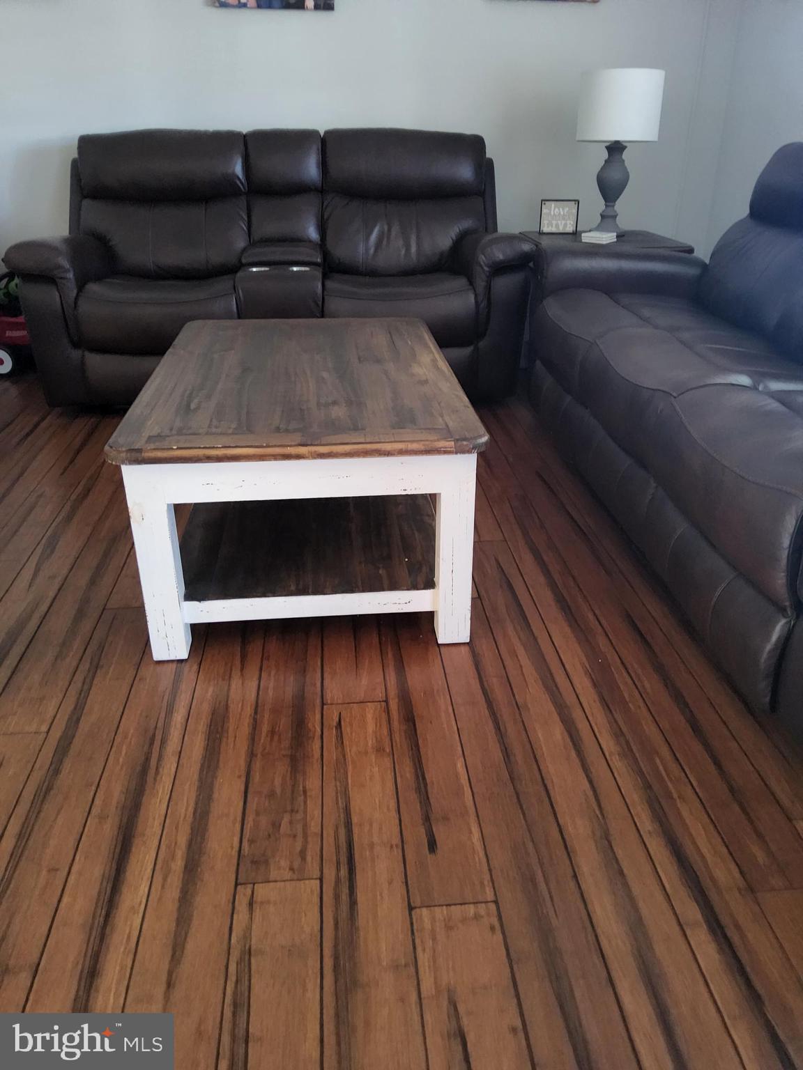 613 Clubhouse Way Culpeper, VA 22701 - Photo 5 of 17 a living room with furniture and wooden floor