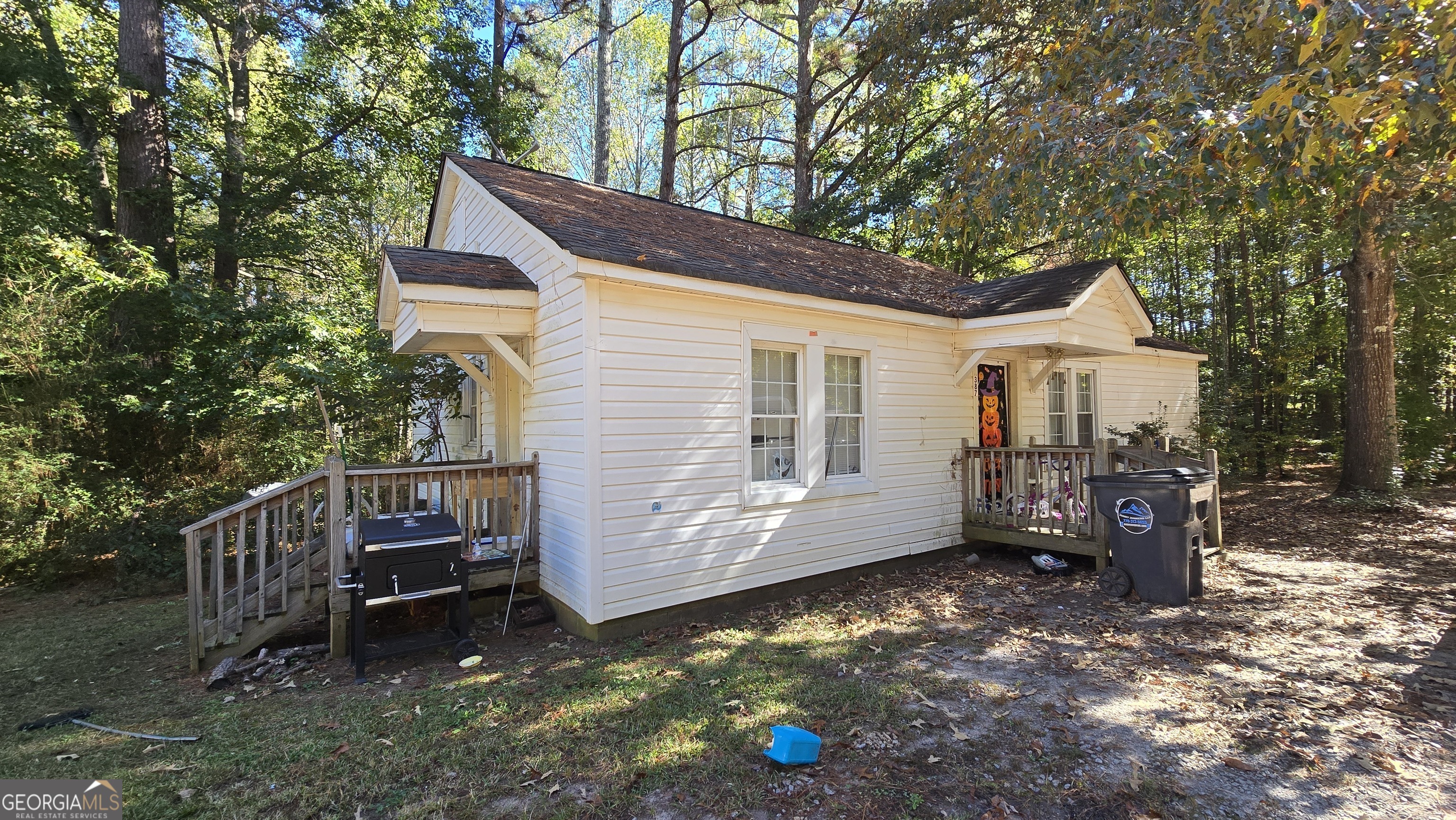 377 Dock Hyde Road Carrollton, GA 30116 - Photo 17 of 31 a view of a house with a yard