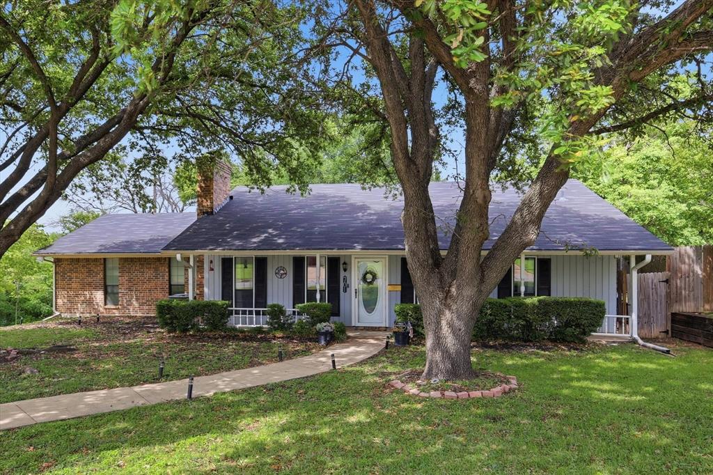 701 Raintree Road Fort Worth, TX 76103 - Photo 2 of 26 Front of home