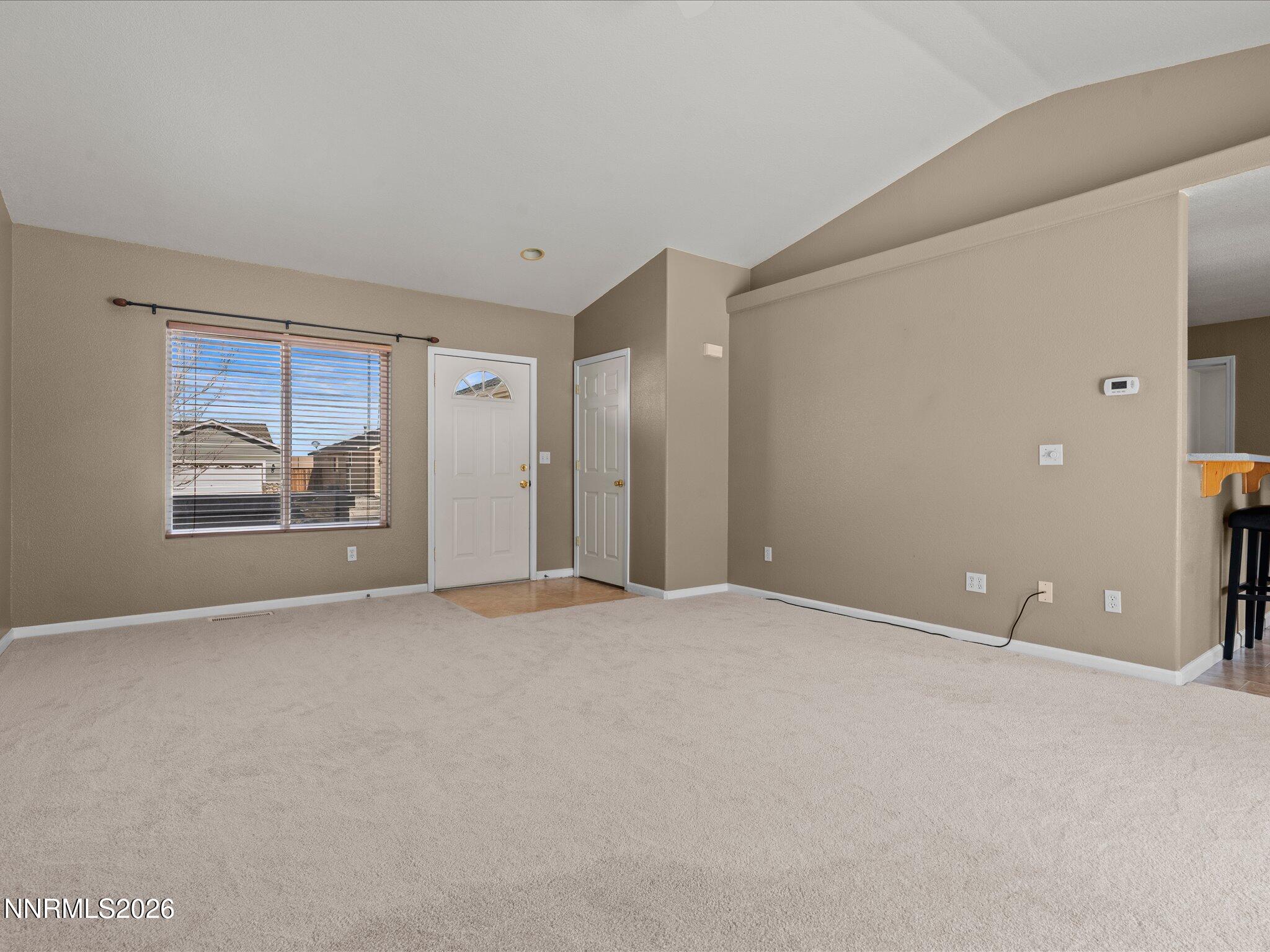400 Bens Way Fernley, NV 89408 - Photo 7 of 31 a view of an empty room with a window