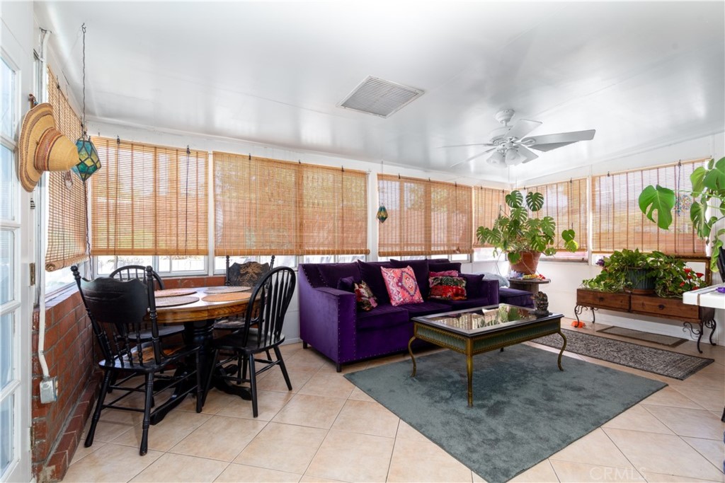 41320 Linda Vista Court Hemet, CA 92544 - Photo 14 of 31 a living room with furniture and a large window