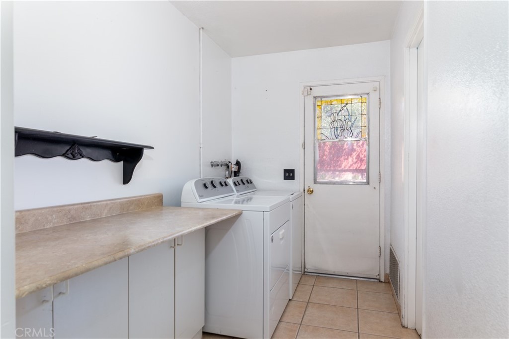 41320 Linda Vista Court Hemet, CA 92544 - Photo 17 of 31 a bathroom with a sink and a mirror