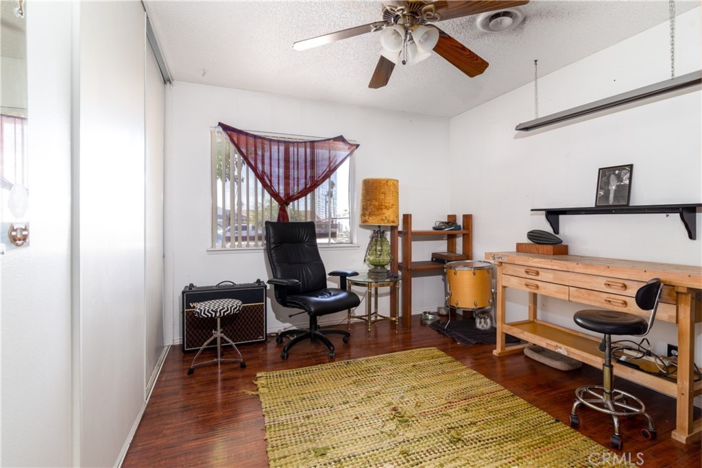 41320 Linda Vista Court Hemet, CA 92544 - Photo 23 of 31 a view of a workspace with furniture and a window