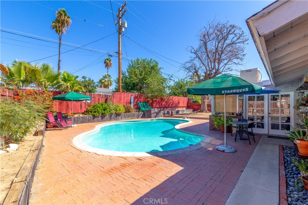 41320 Linda Vista Court Hemet, CA 92544 - Photo 24 of 31 a view of a swimming pool with a patio