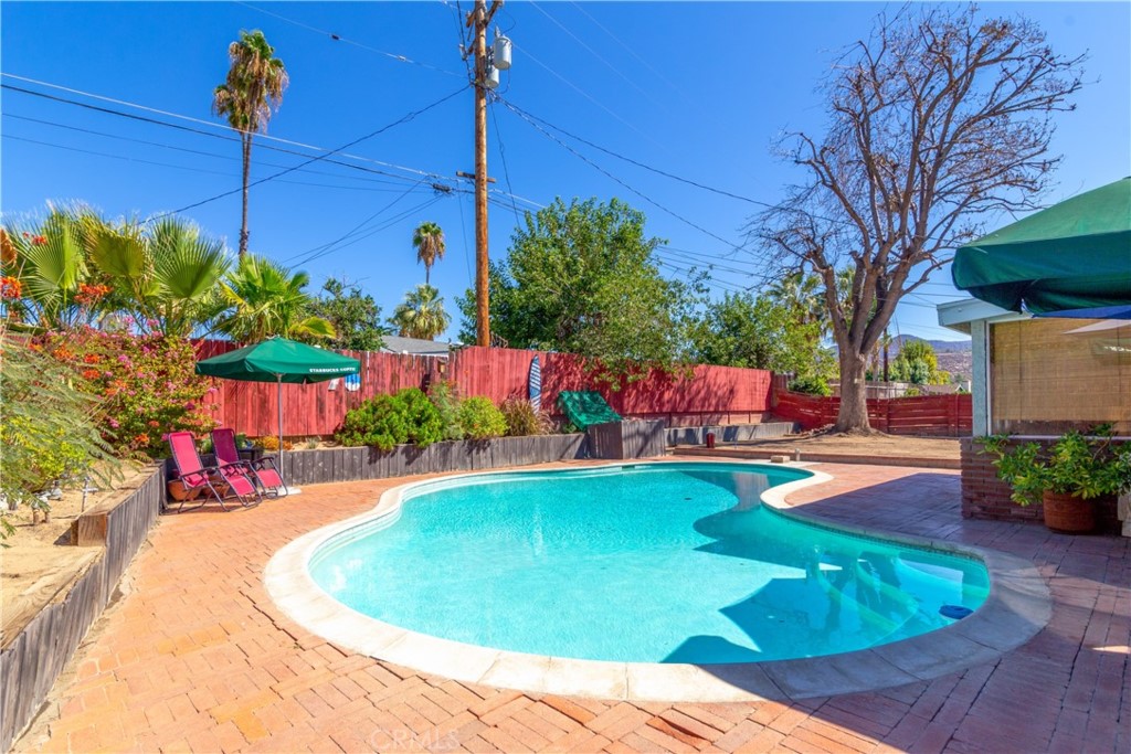 41320 Linda Vista Court Hemet, CA 92544 - Photo 25 of 31 a view of a swimming pool with a patio